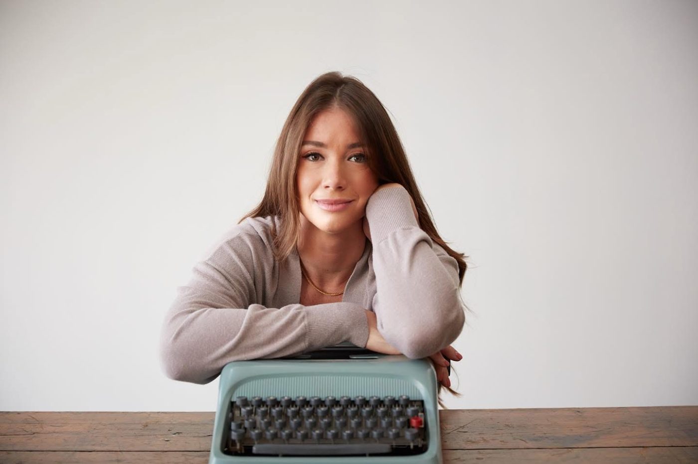 Tabitha Rose, founder of Life to Paper Publishing, at a typewriter