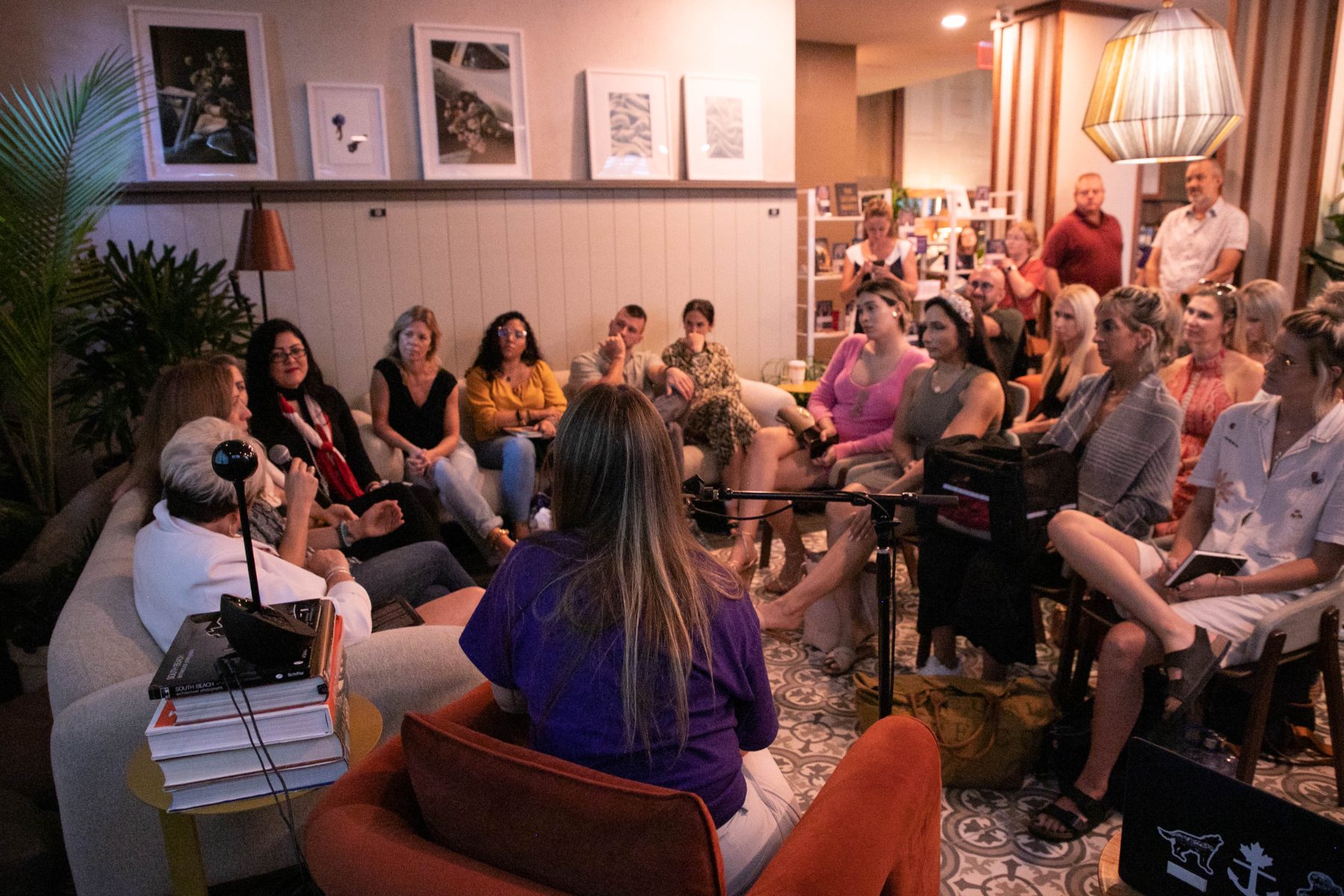 Tabitha speaking to a full room