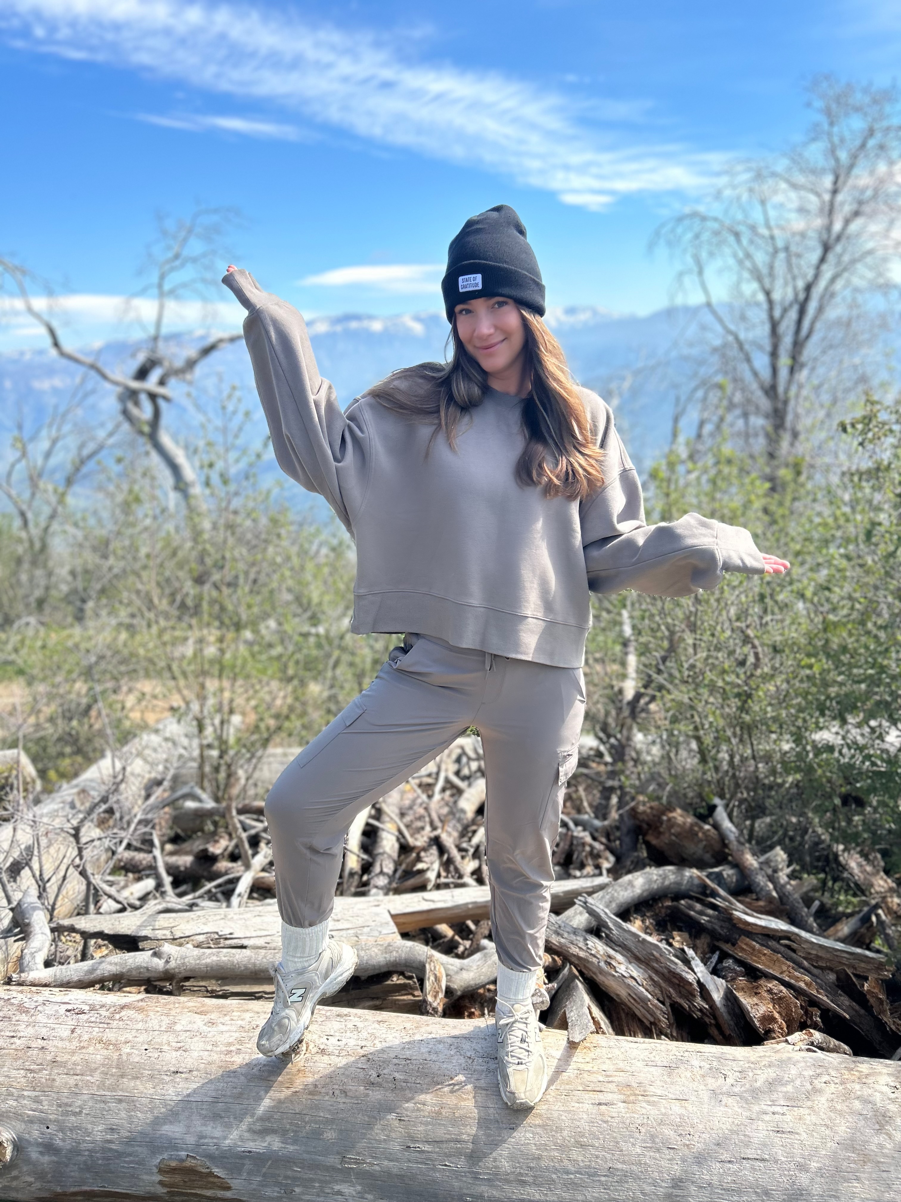 Tabitha outdoors with mountains behind her